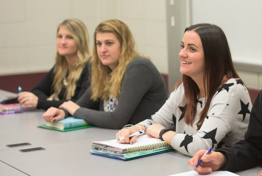 Three female students in class